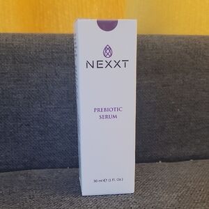 Nexx Prebiotic Serum in White and Purple Packaging